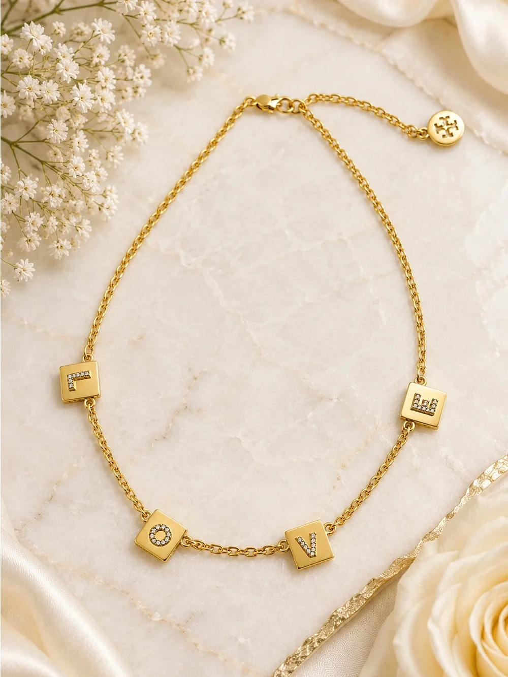 Tory Burch elegant gold